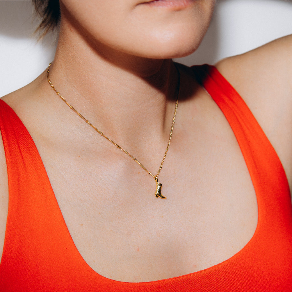 Collier botte de cowboy