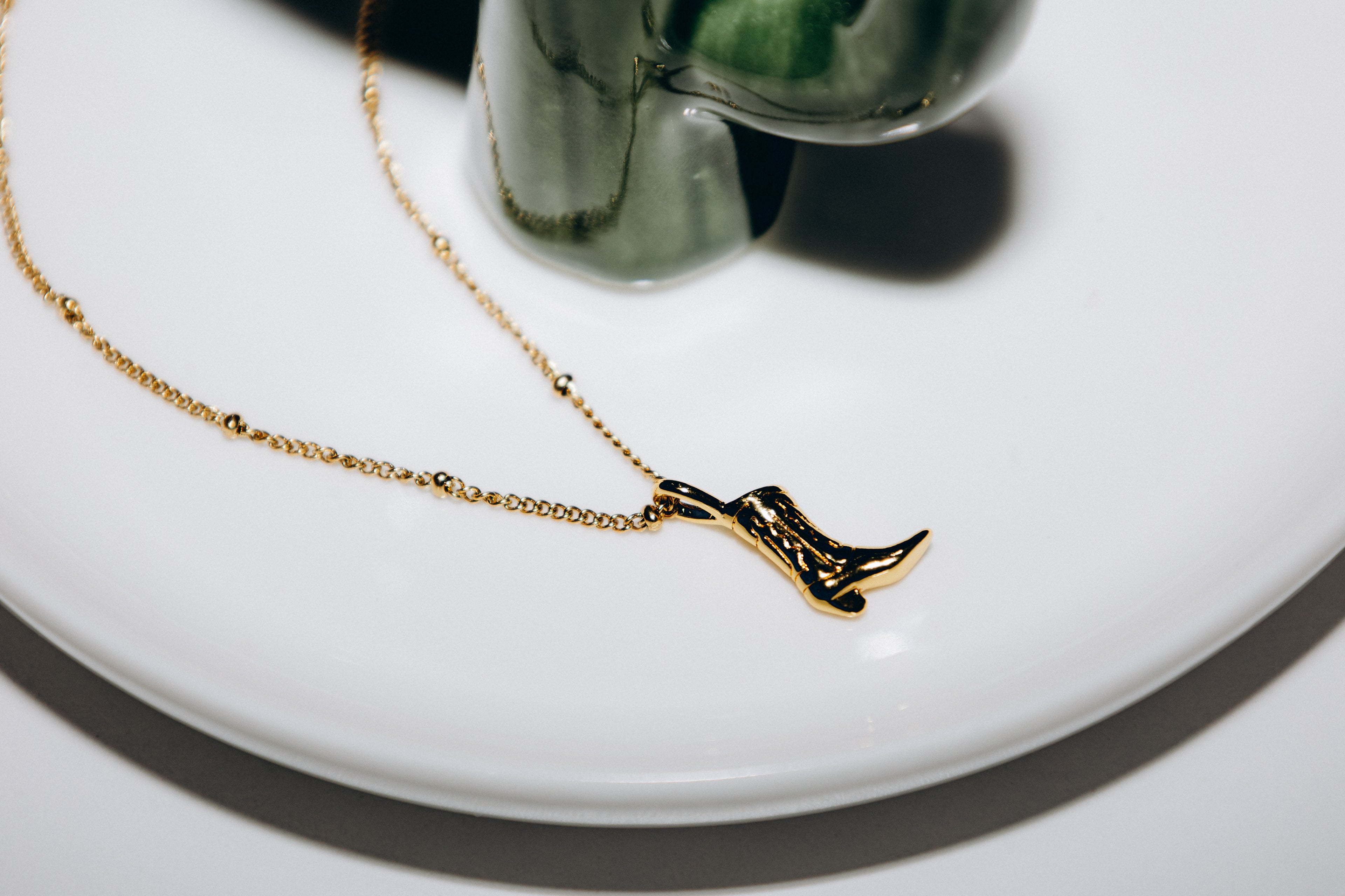 Collier botte de cowboy