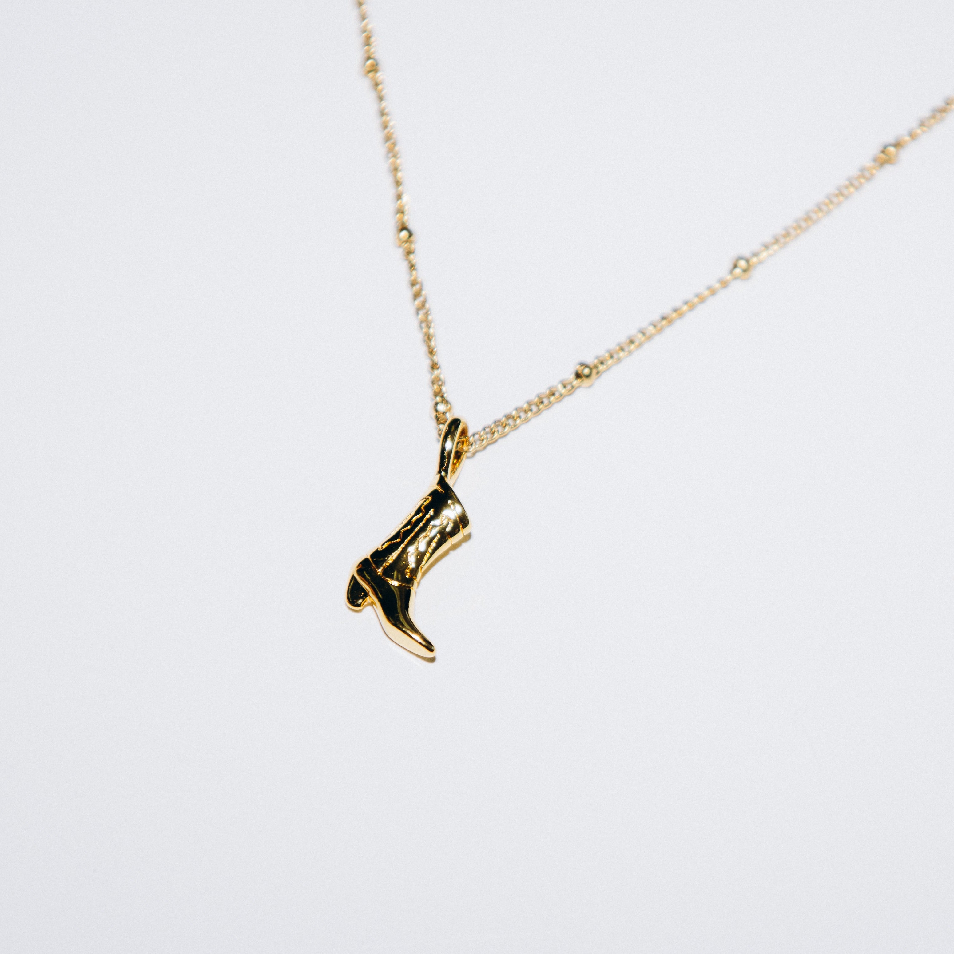 Collier botte de cowboy